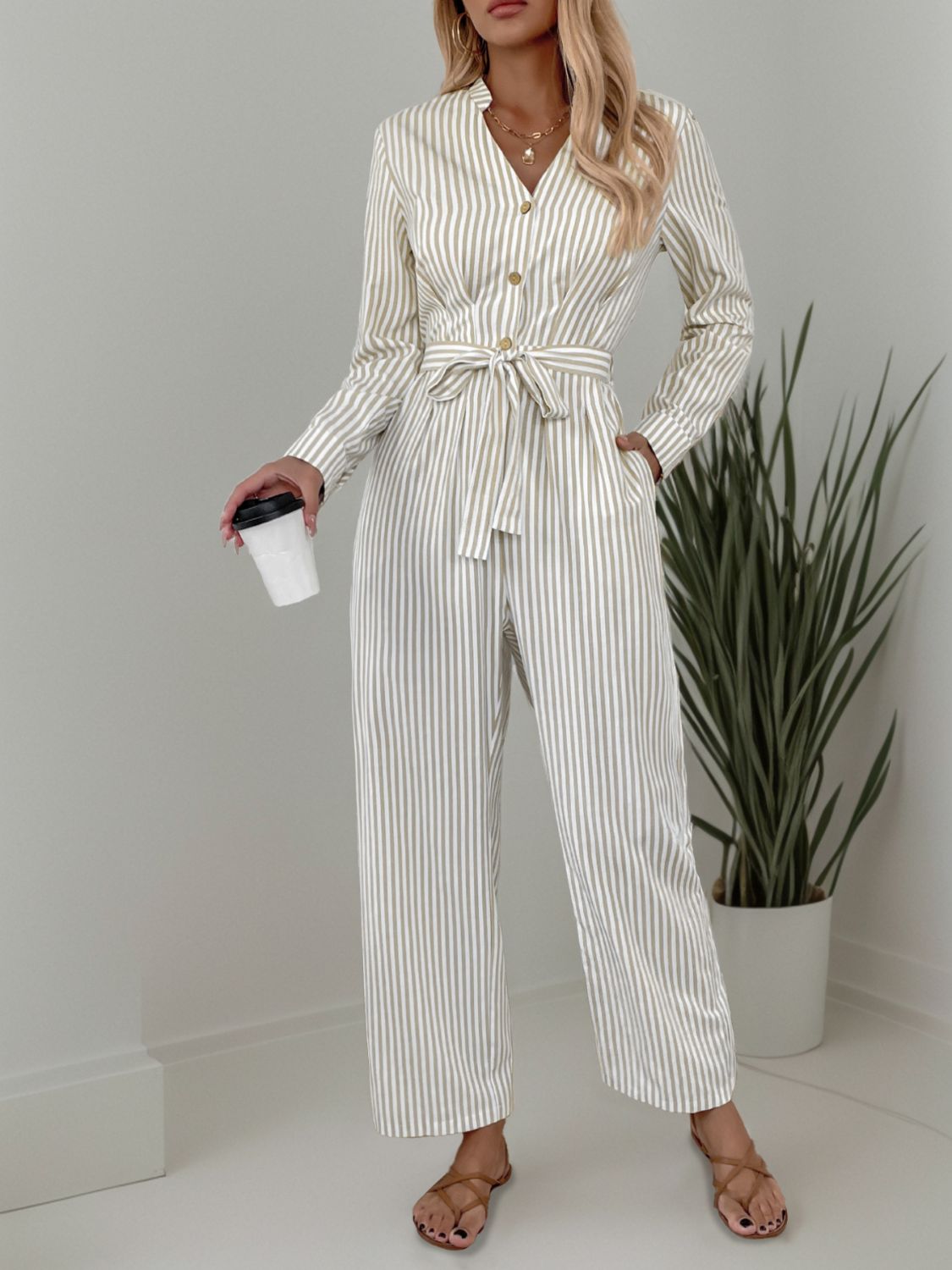 Striped Notched Long Sleeve Tie Waist Jumpsuit - EkaVibe