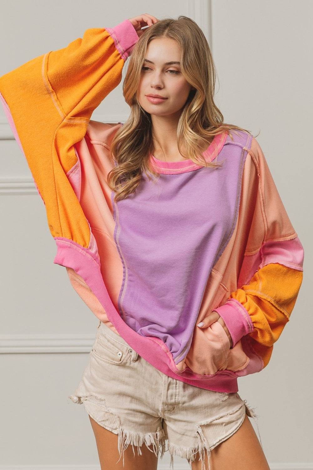 BiBi Color Block Exposed Seam Sweatshirt with Pockets - EkaVibe