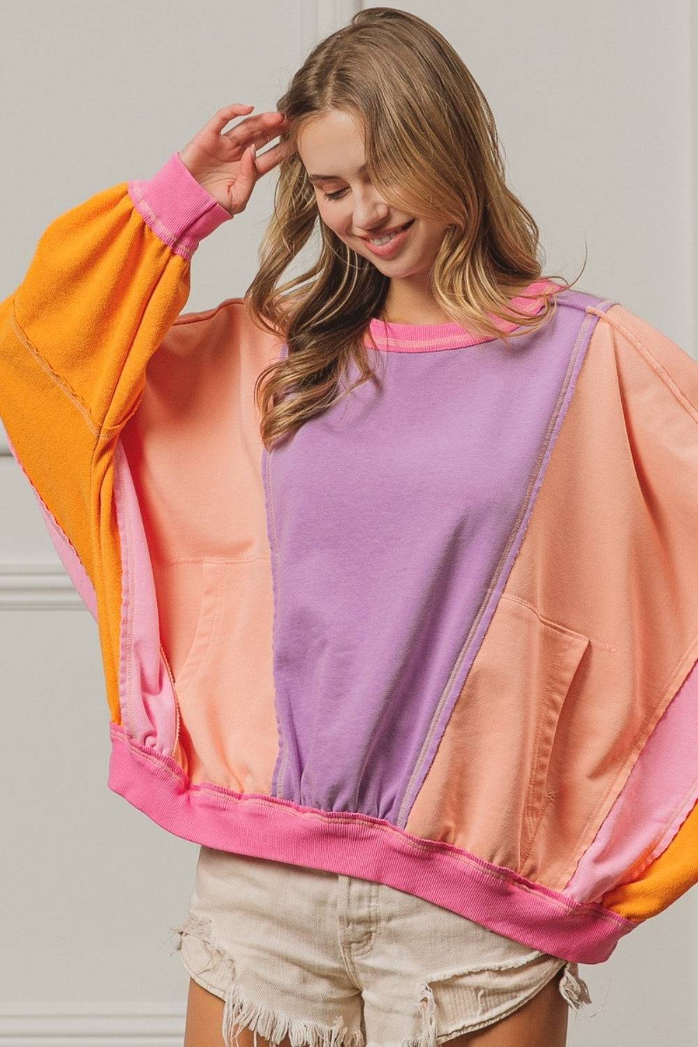 BiBi Color Block Exposed Seam Sweatshirt with Pockets - EkaVibe